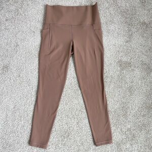 Athleta Salutation Stash Pocket II 7/8 Tight Leggings Size Small Mineral Brown